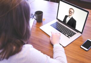 Student on laptop preparing for a virtual college interview